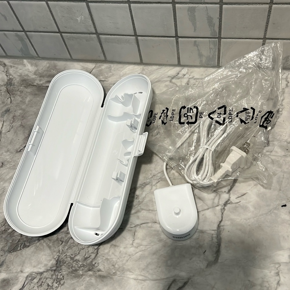 Phillips Clear-sonic charging cable and toothbrush box, no toothbrush included